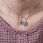 Oval cut green diamond pendant white gold