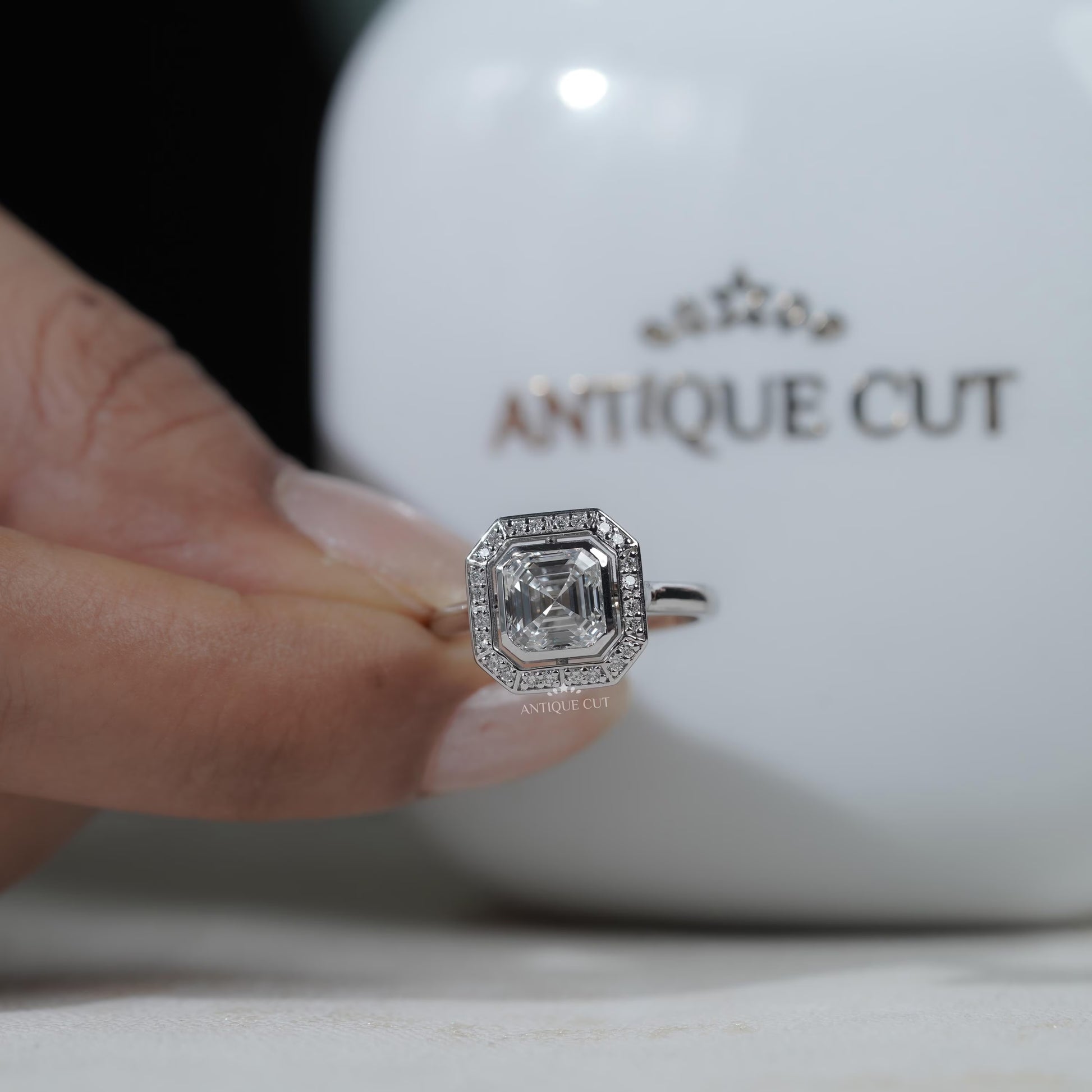 Lab grown Asscher cut diamond ring with bezel setting
