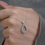 Refined teardrop pendant necklace yellow gold
