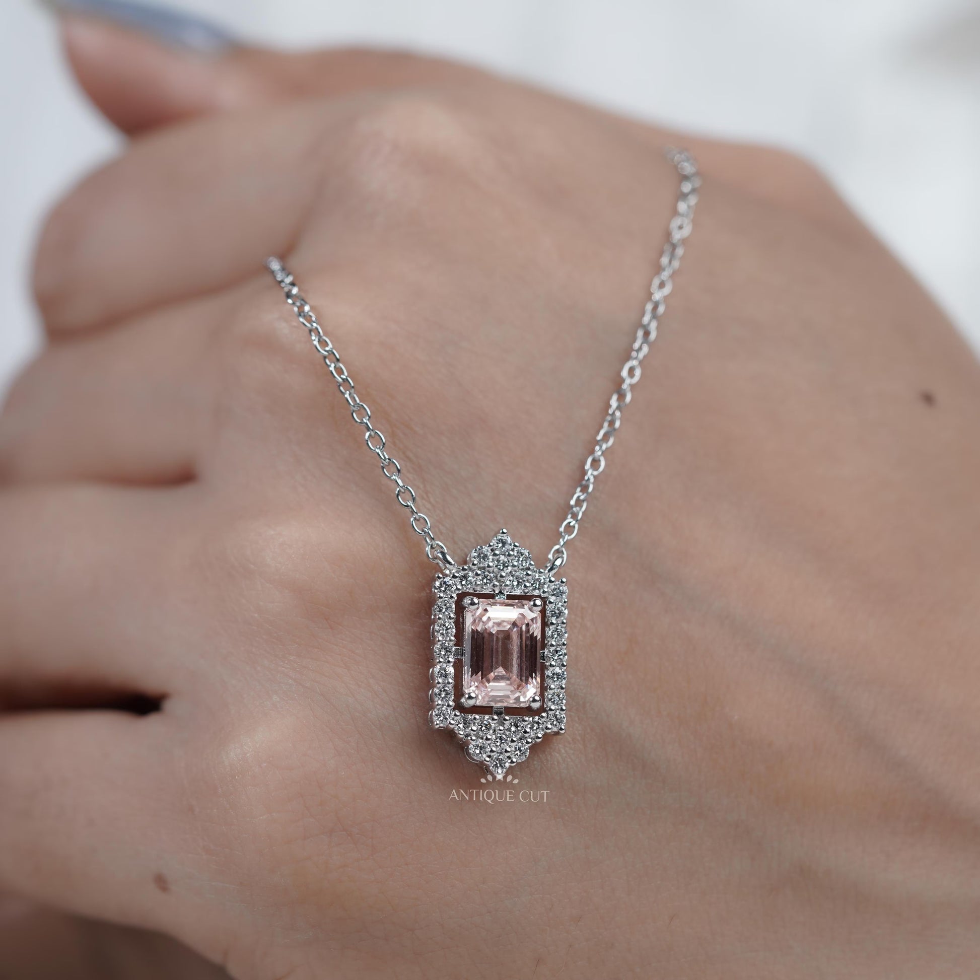 Classic blush pink emerald pendant with diamonds