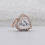 Rose gold heart-shaped diamond pendant with halo