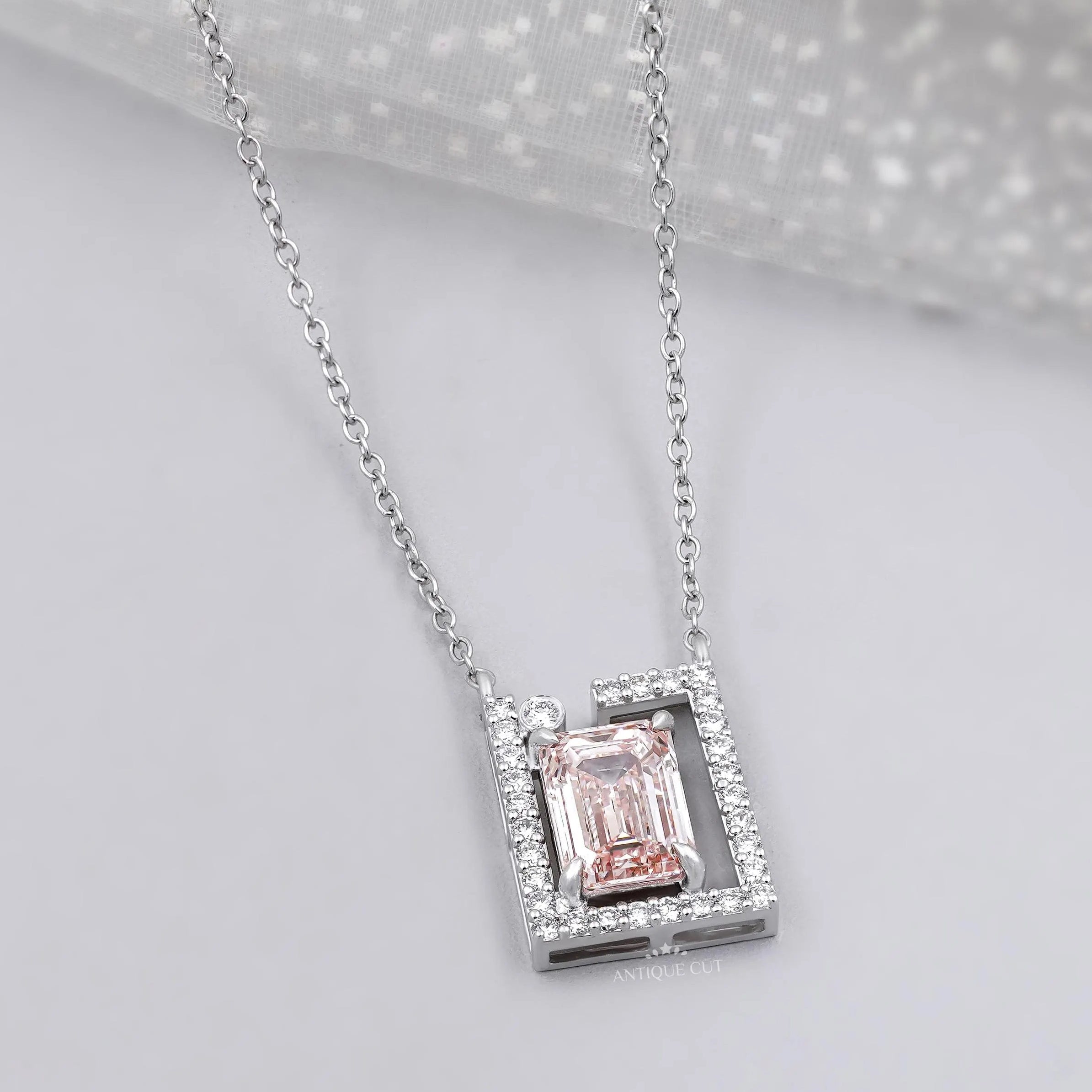 Emerald modern frame diamond pendant in white gold