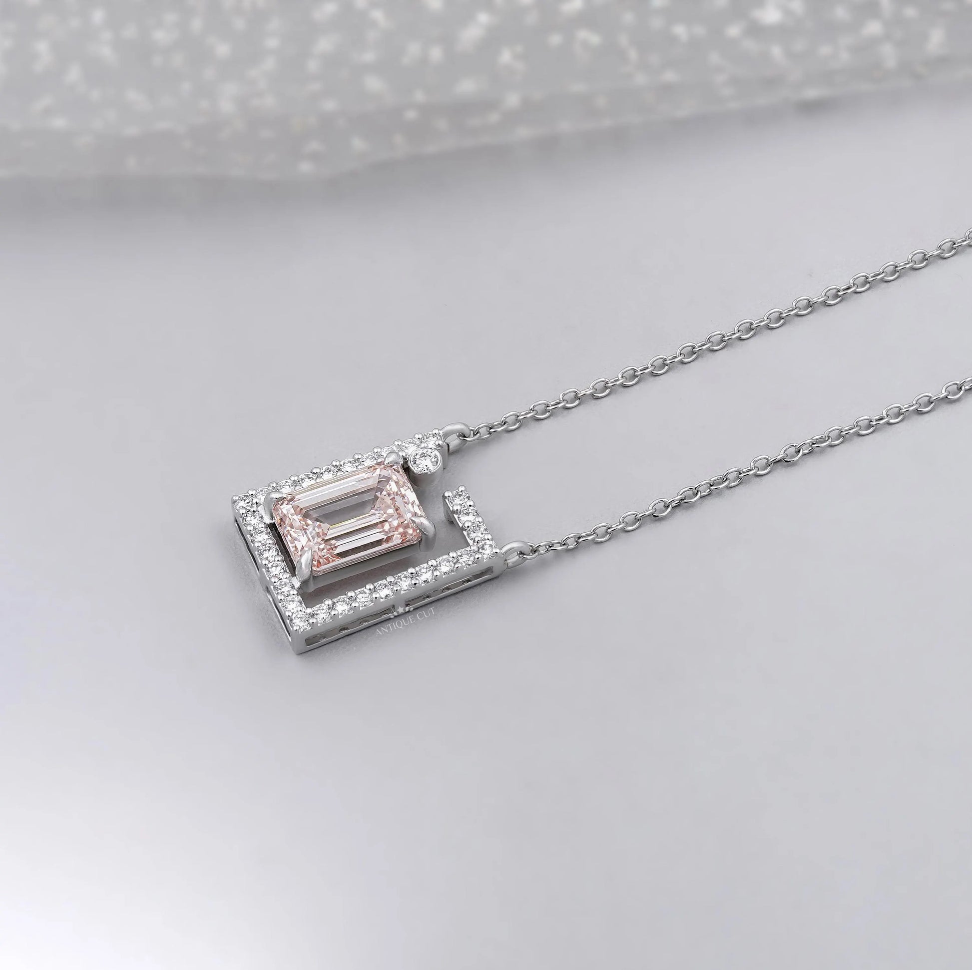 Elegant emerald modern frame pendant with diamonds