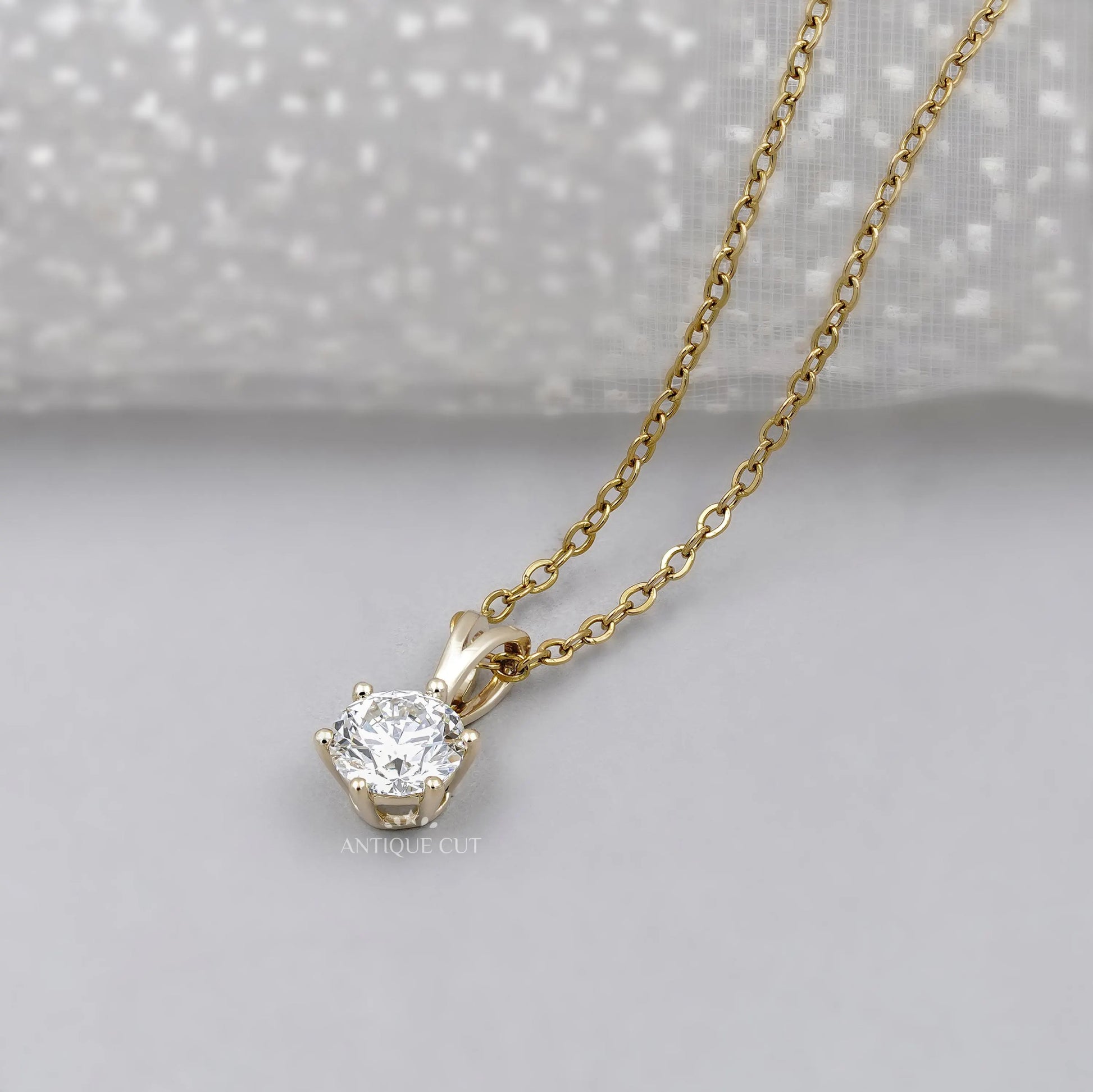 Minimal round diamond solitaire necklace