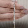 Modern curved bar pendant with round diamonds