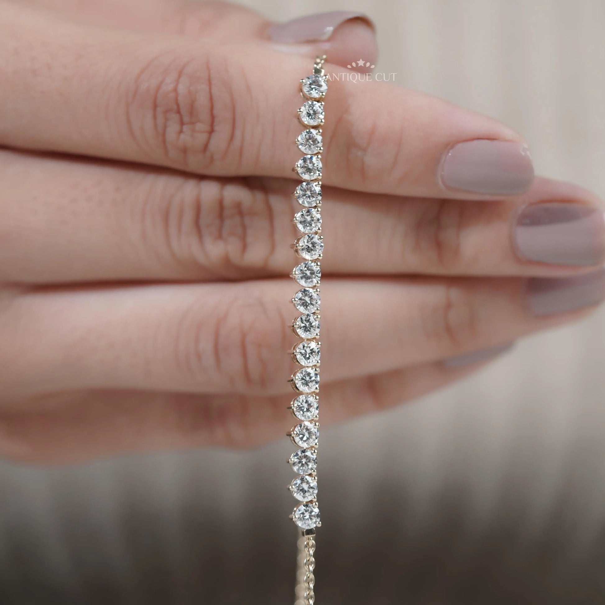 Modern curved bar pendant with round diamonds