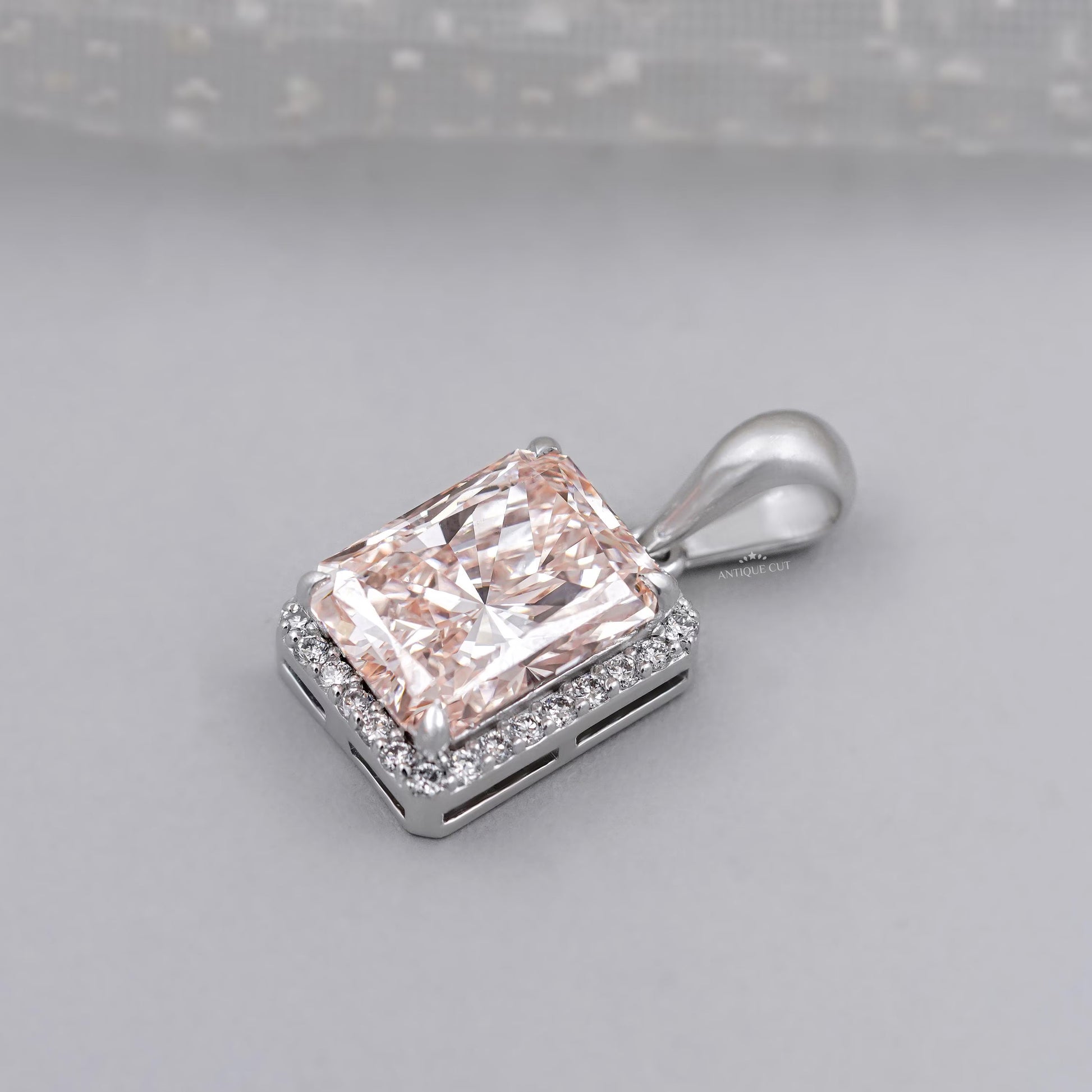 Antiquecut pink diamond halo pendant
