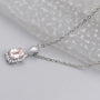 Lab grown emerald cut diamond pendant with halo setting