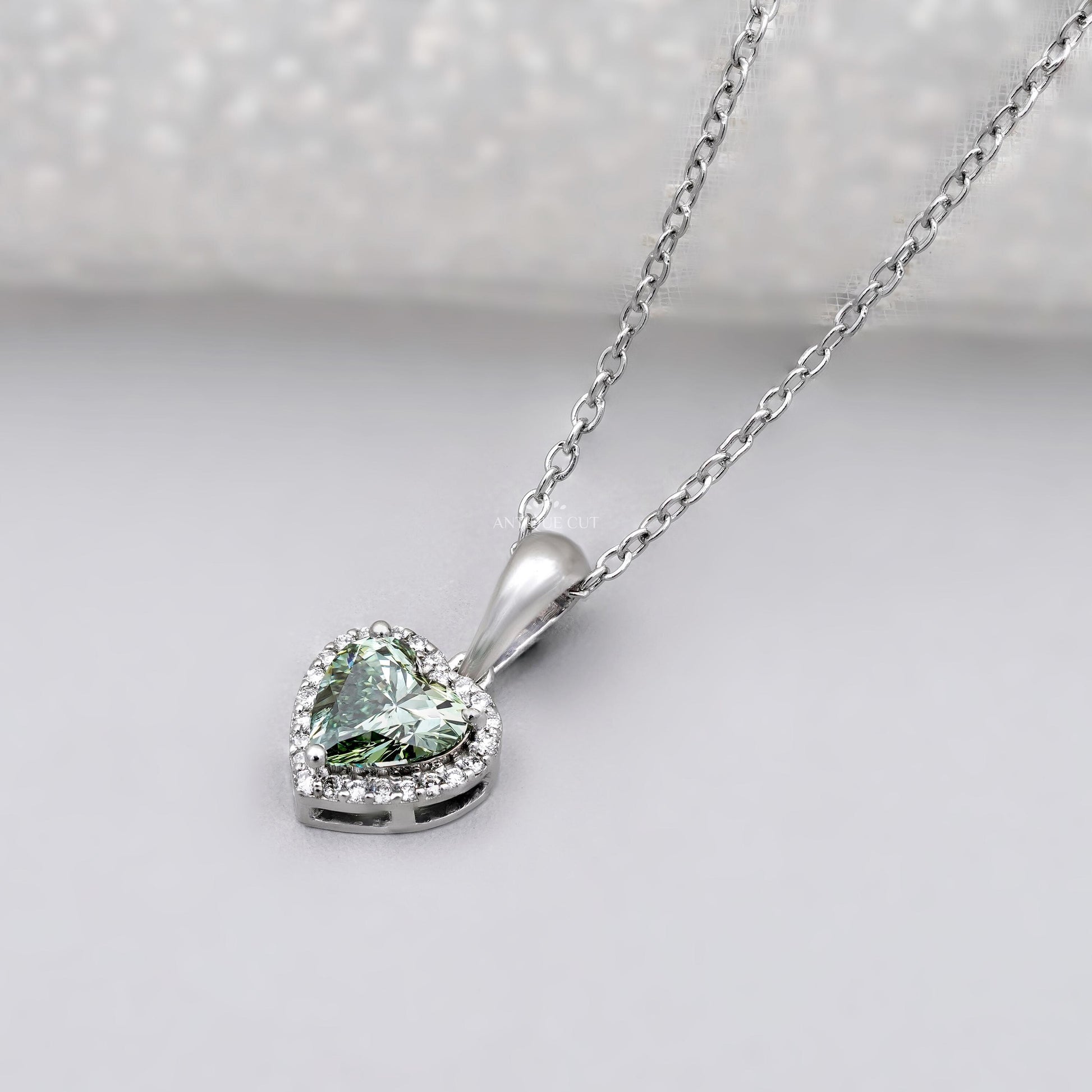 Antiquecut green heart diamond necklace