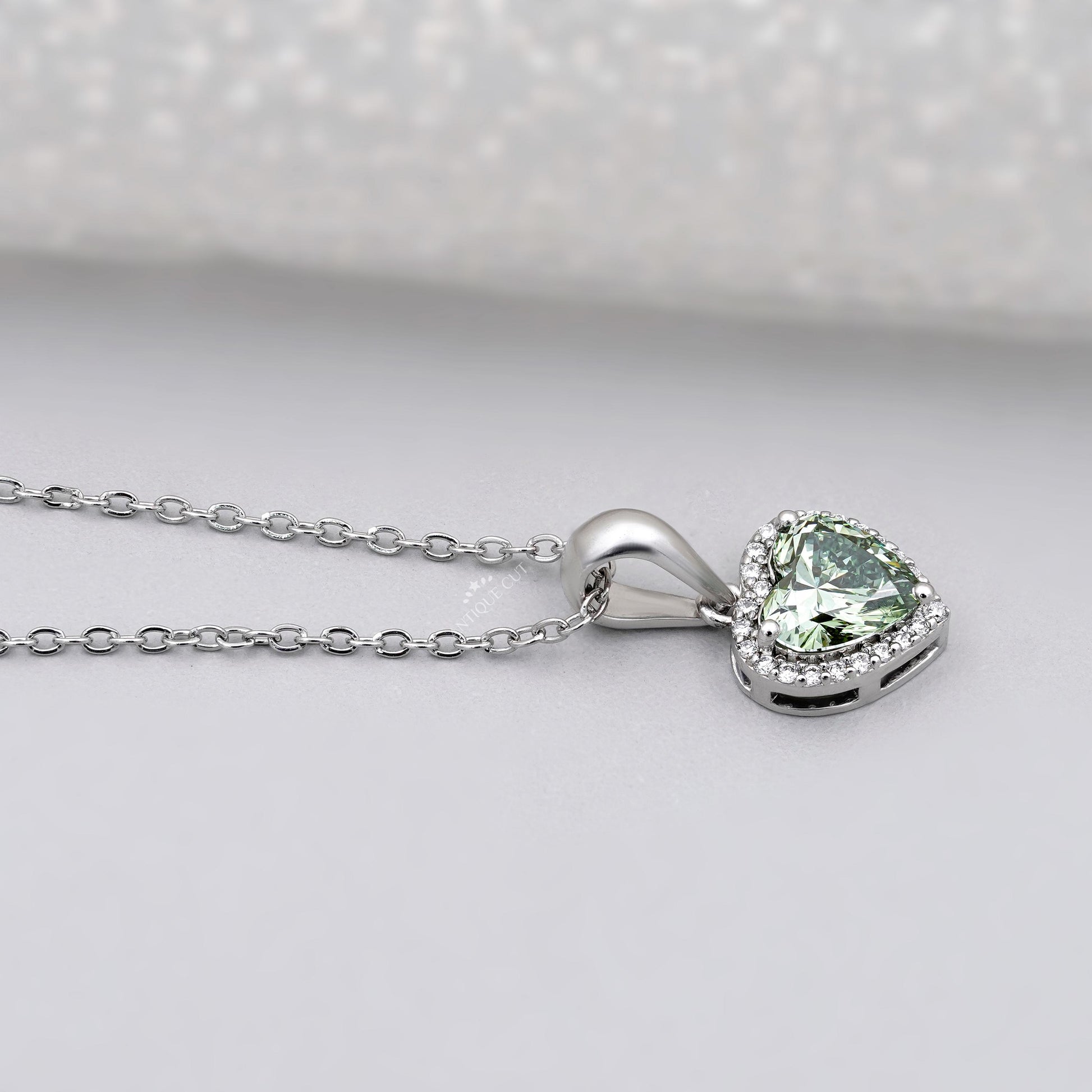 Lab grown green diamond halo pendant