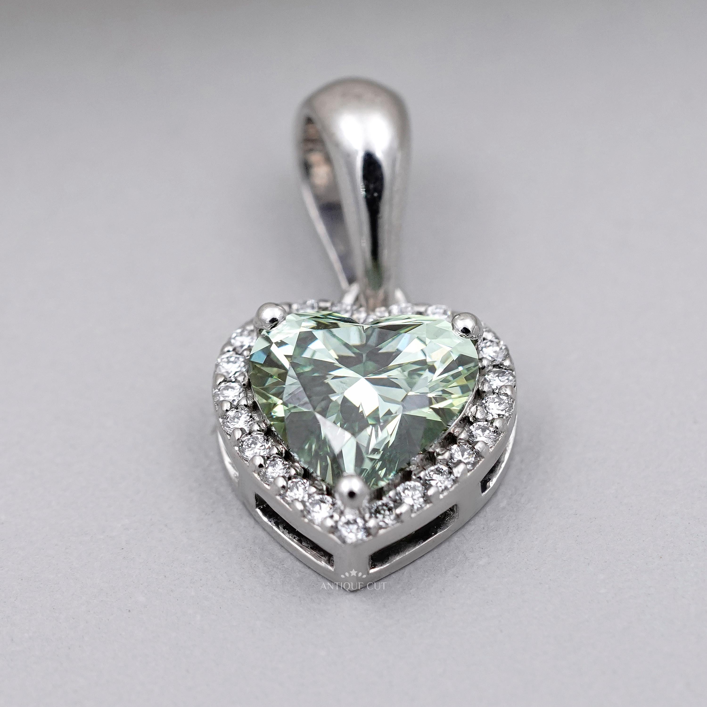 Elegant green heart diamond halo pendant in white gold