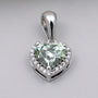 Elegant green heart diamond halo pendant in white gold
