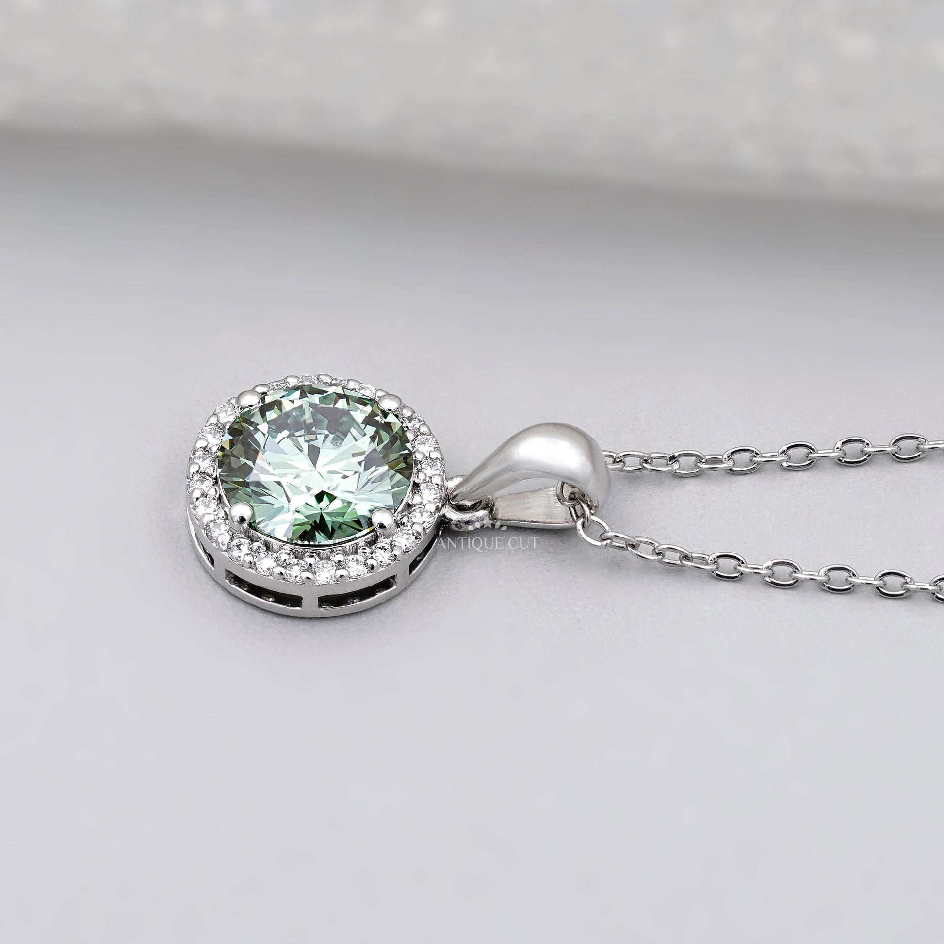IGI certified round green diamond pendant