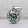 Classic round halo green diamond pendant in white gold