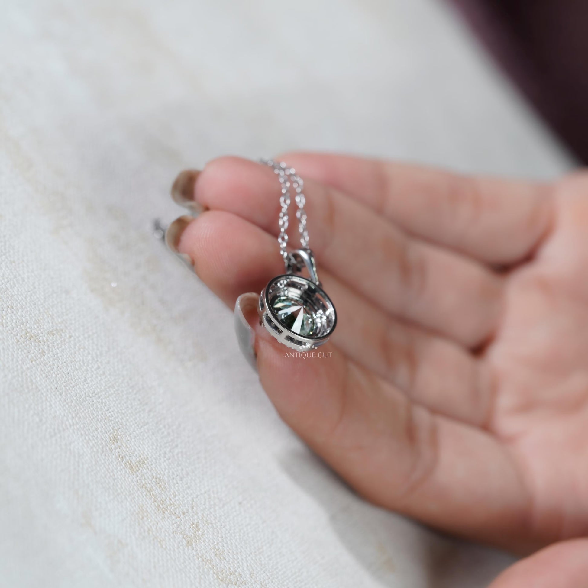 Lab grown green diamond halo pendant