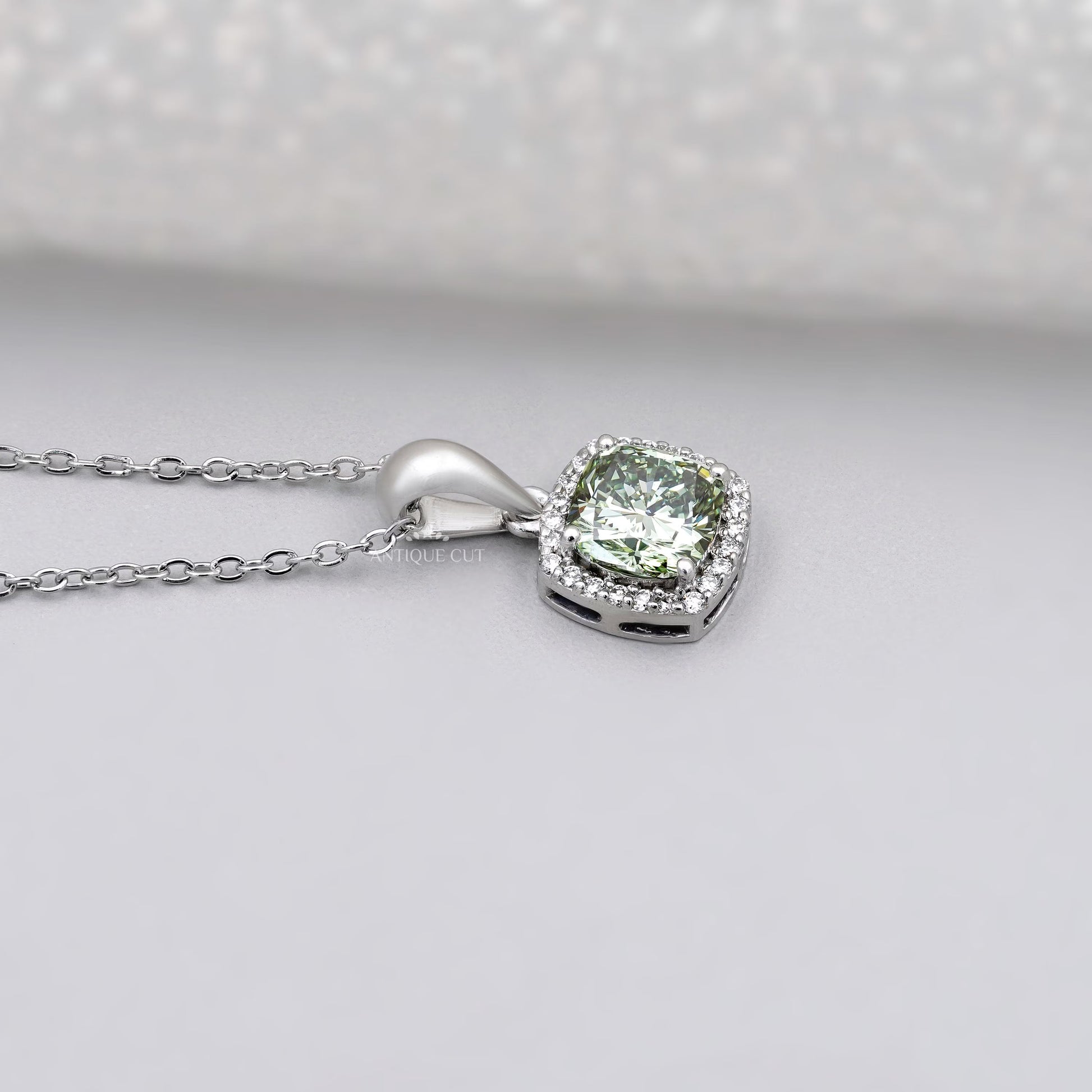 Elegant cushion halo pendant design