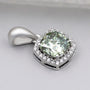 Cushion cut green diamond pendant with halo setting