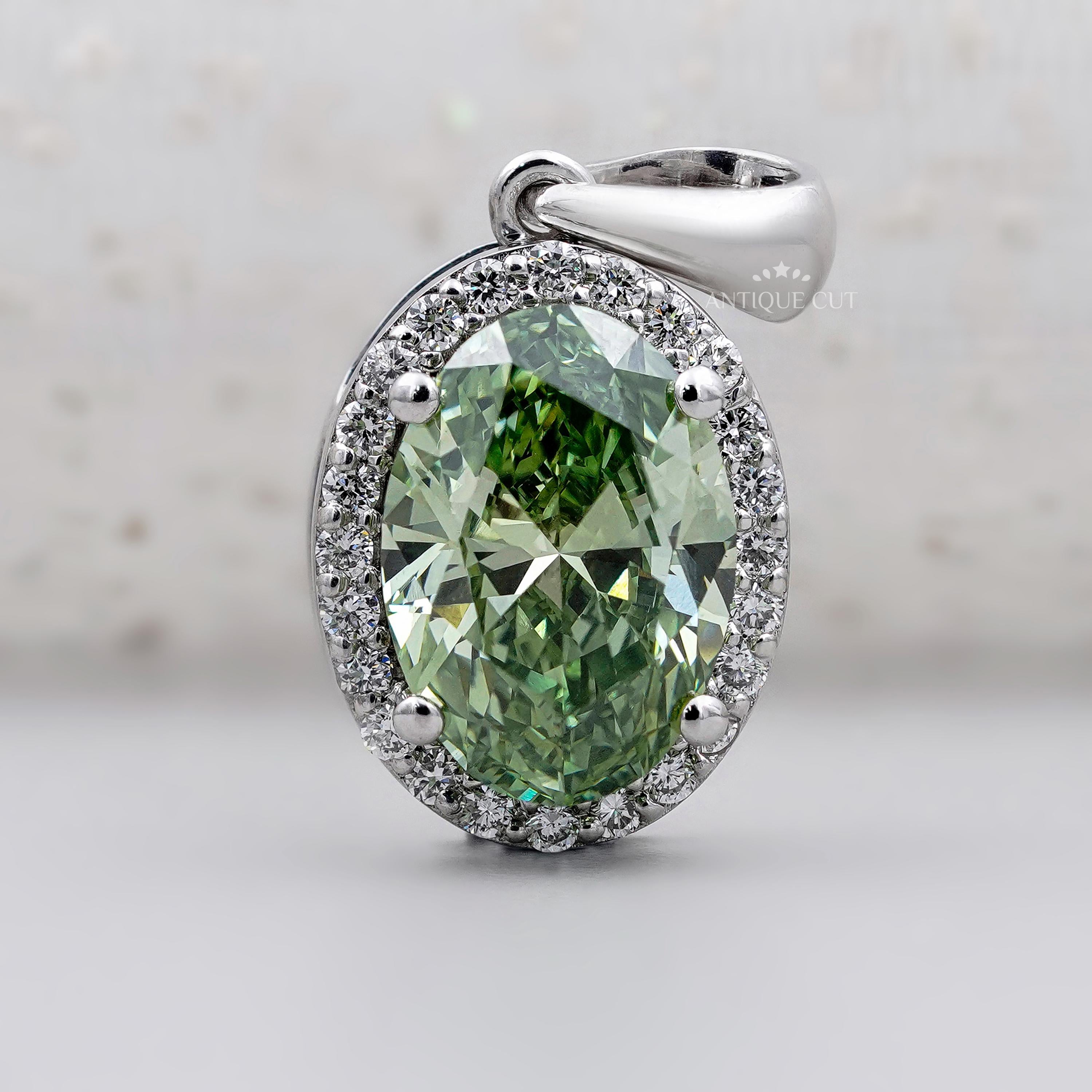 Elegant oval green diamond pendant in white gold