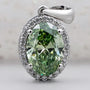 Elegant oval green diamond pendant in white gold
