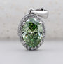 Elegant oval green diamond pendant in white gold