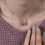 Contemporary green diamond pendant design