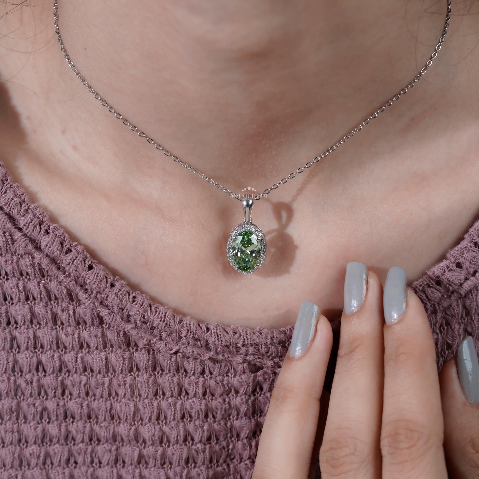 Contemporary green diamond pendant design