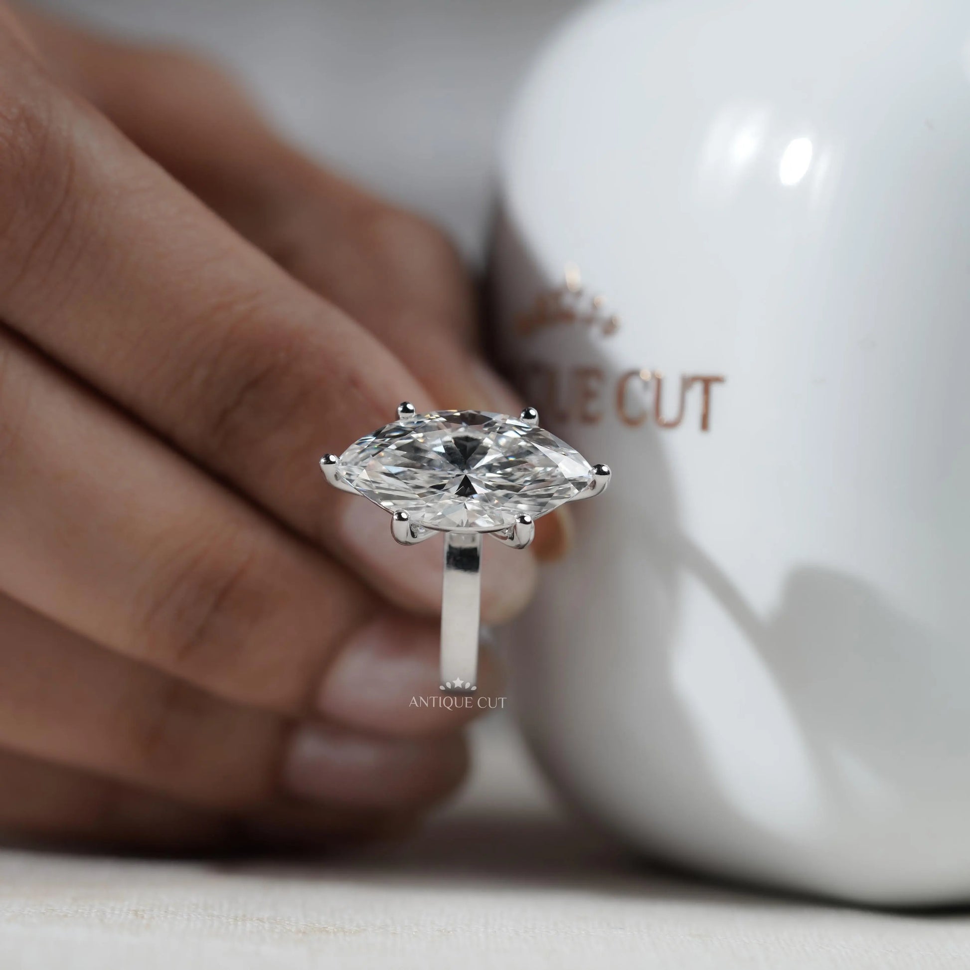 Modern white gold marquise solitaire ring