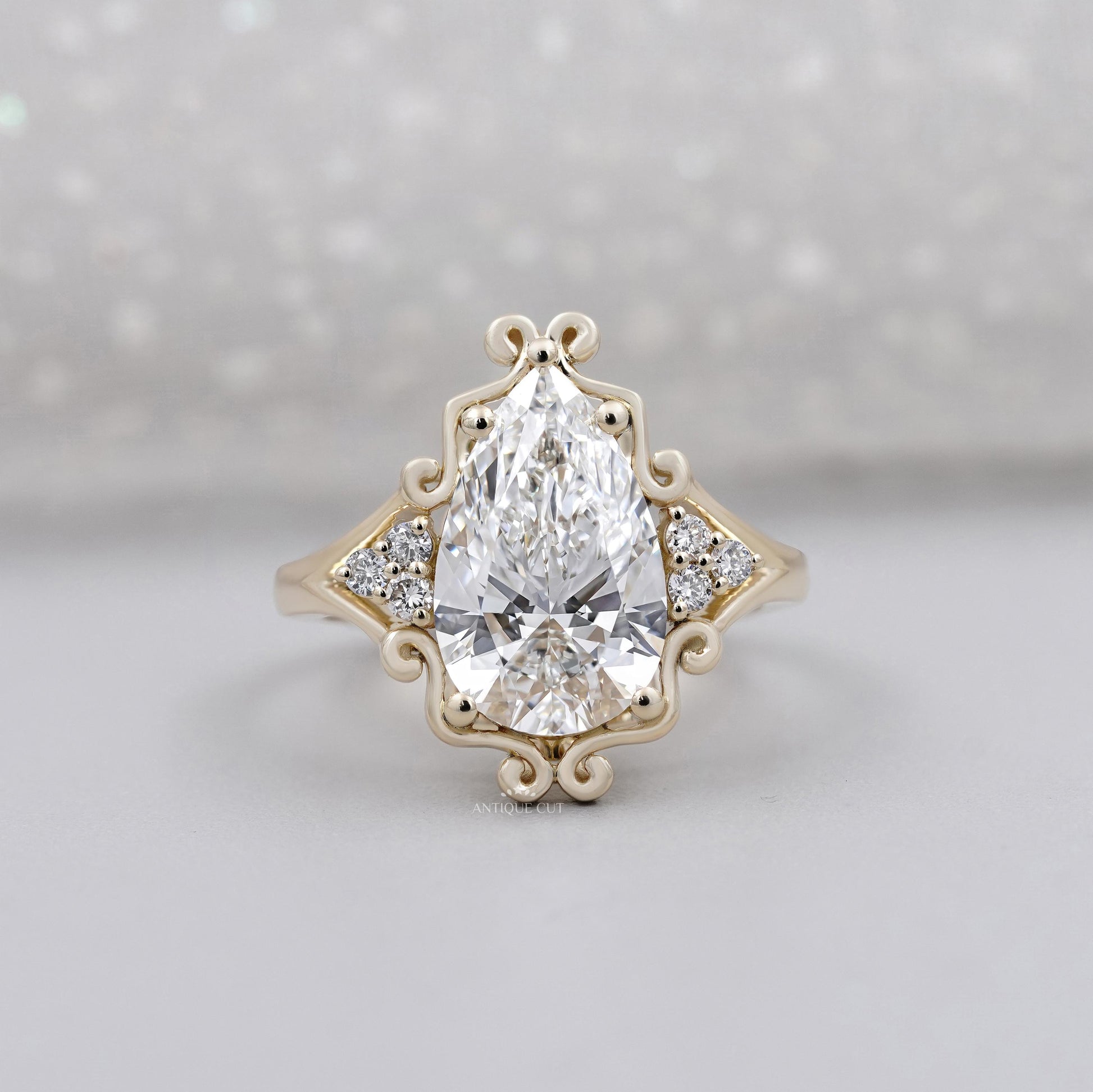 Vintage Pear Cut Diamond with Unique Engagement Ring in Yellow Gold