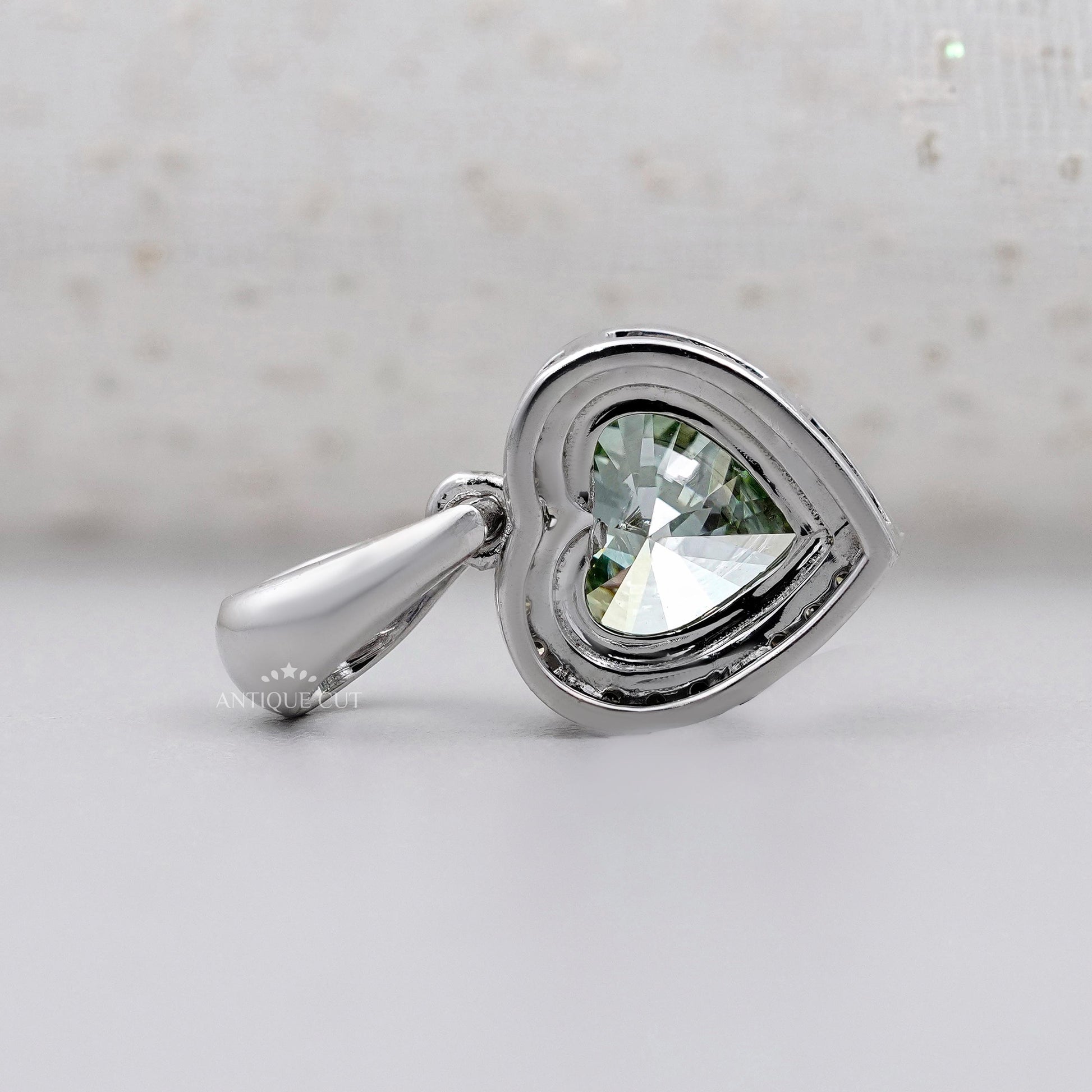 Luxury green diamond pendant with halo setting