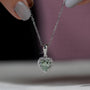 Romantic heart shaped diamond pendant in white gold