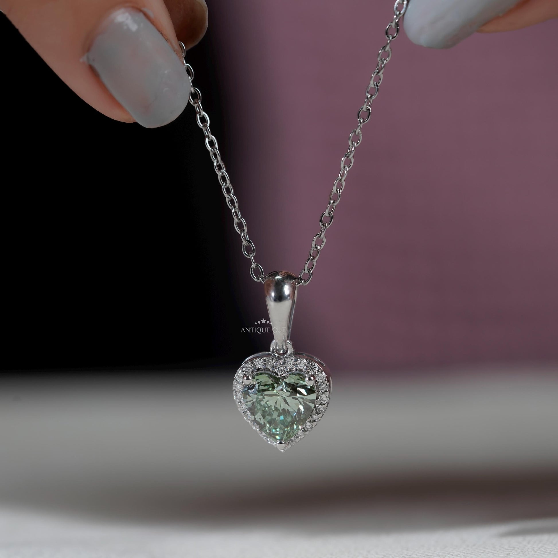 Romantic heart shaped diamond pendant in white gold