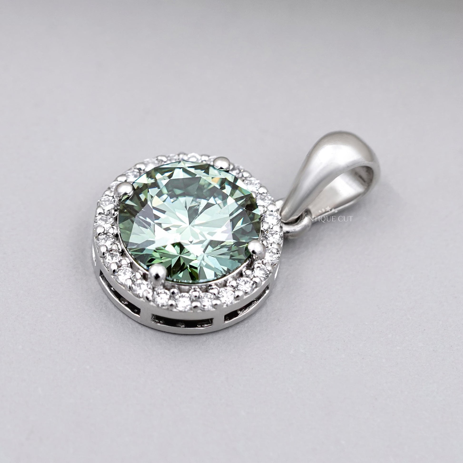 White gold green diamond pendant