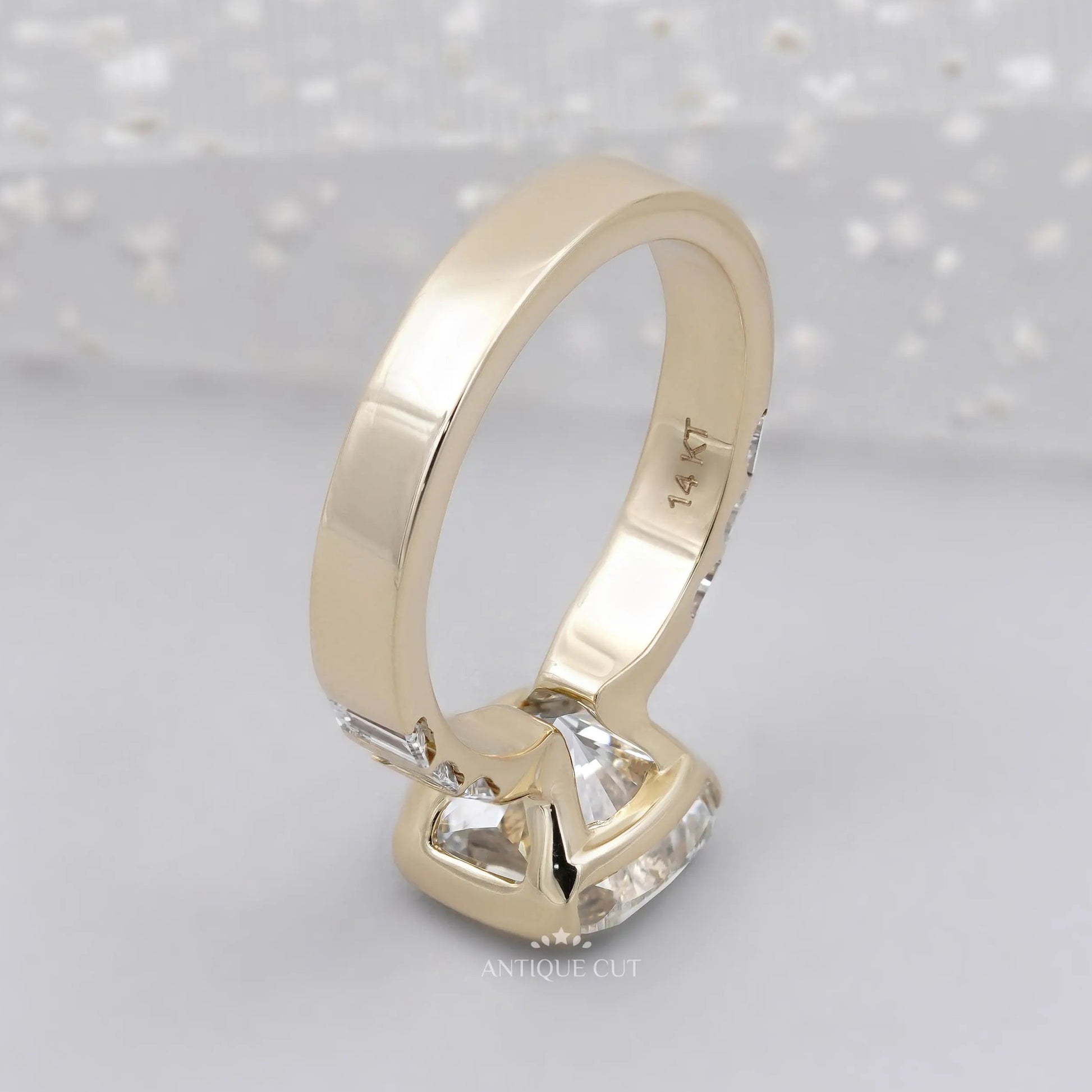 Half bezel cushion cut diamond ring with gold setting