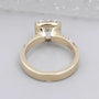 East West cushion diamond solitaire ring in yellow gold