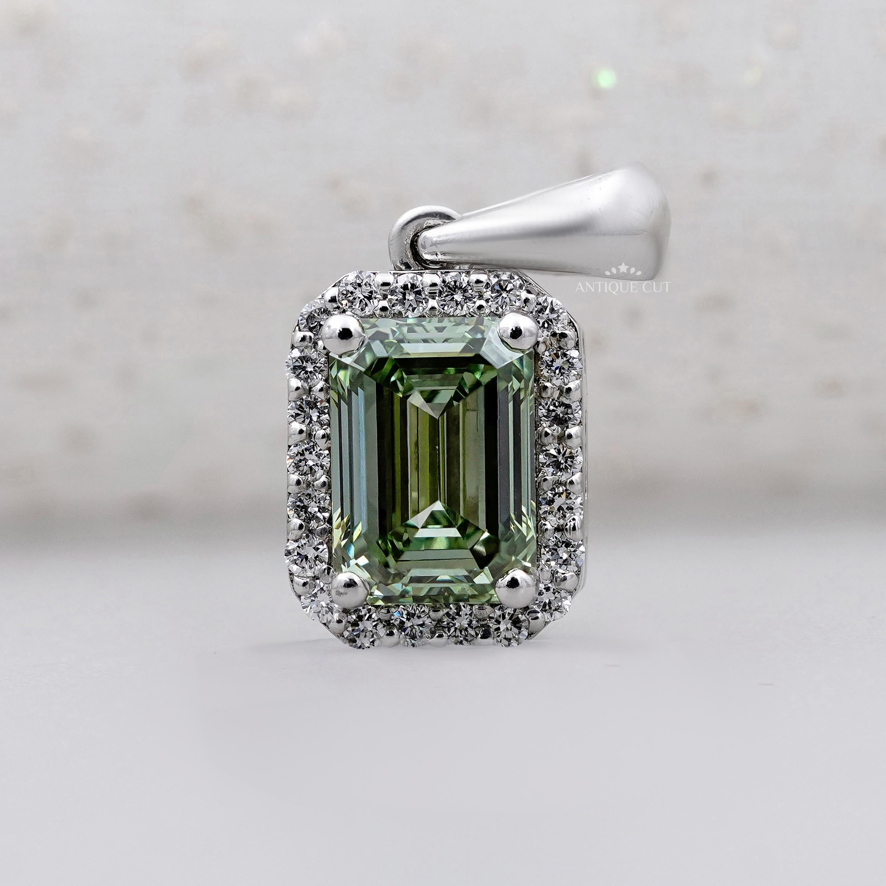 Royal emerald halo pendant in white gold