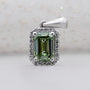 Royal emerald halo pendant in white gold