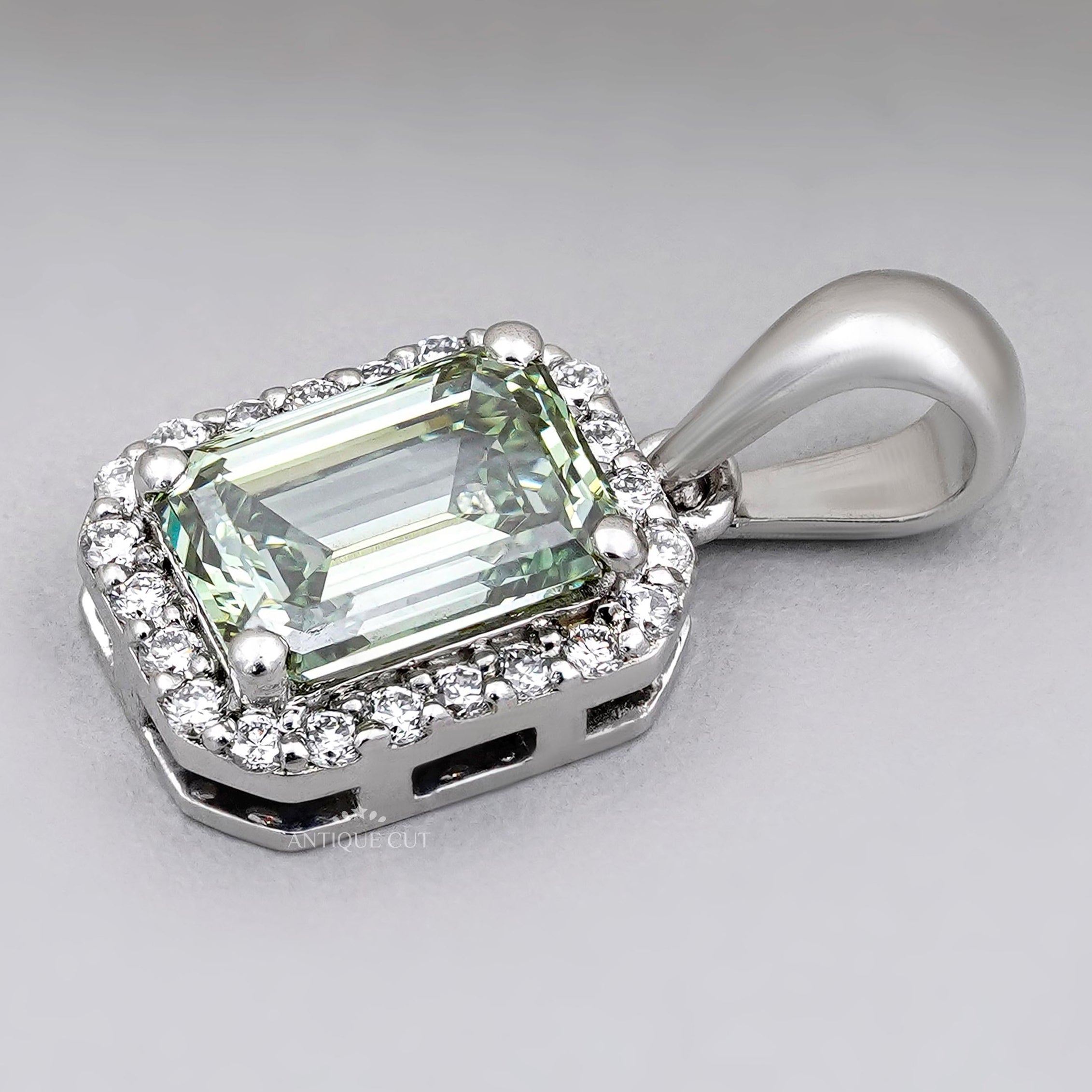 Emerald-cut diamond halo necklace