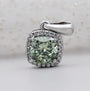 Cushion cut green moissanite halo pendant in white gold