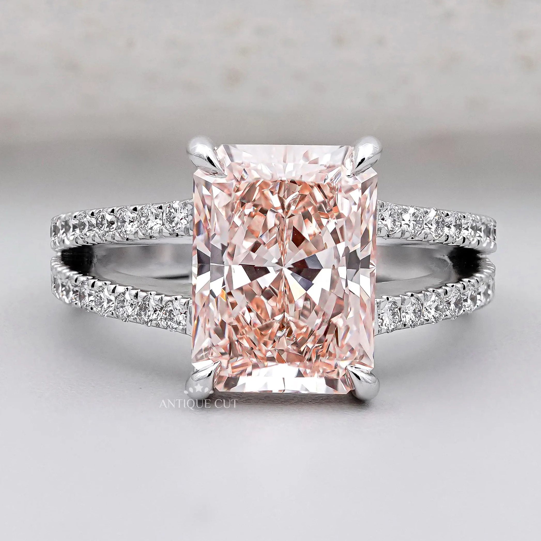 Radiant pink diamond split shank engagement ring in white gold