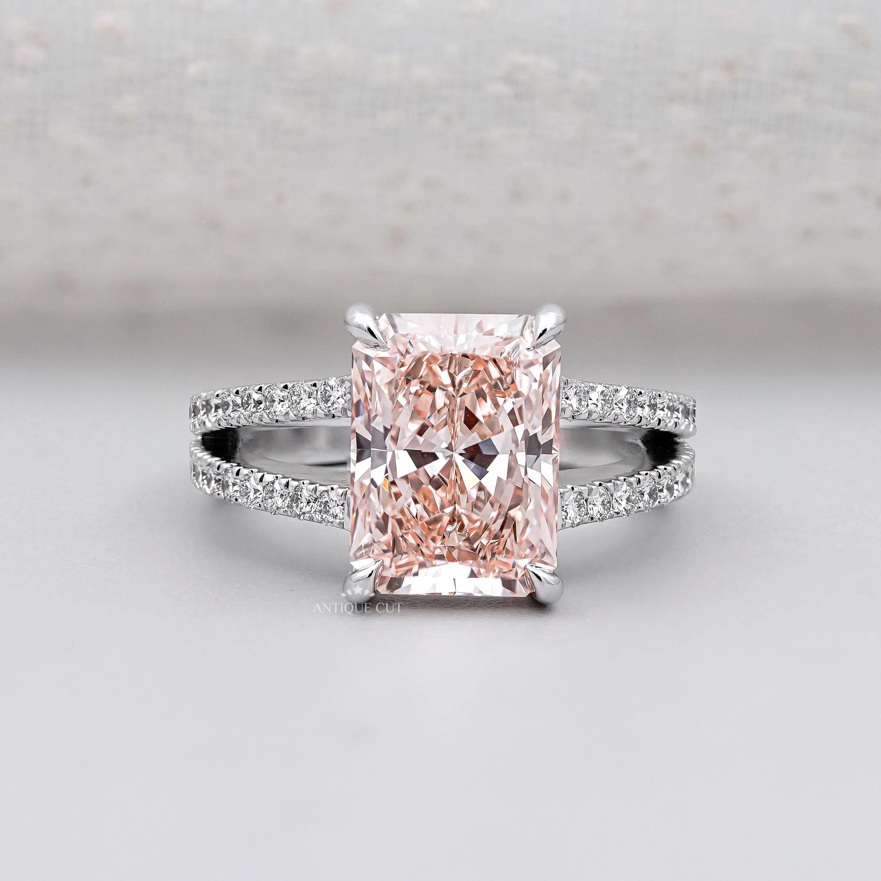 Radiant pink diamond split shank engagement ring in white gold