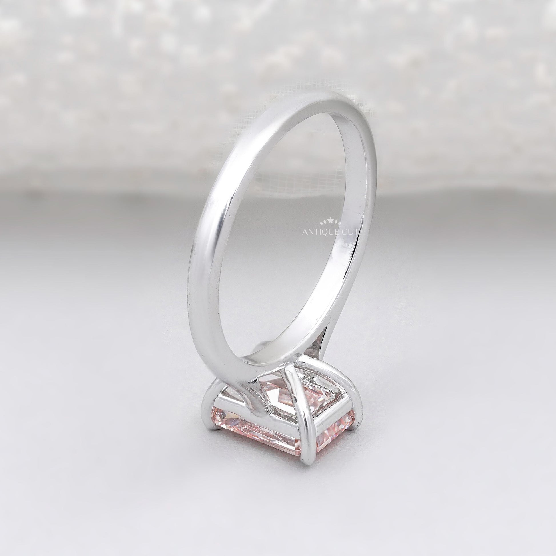 Lab grown emerald cut pink diamond ring