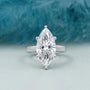 Marquise cut solitaire engagement ring in white gold