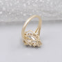 Elegant pear cut diamond ring with detailed gold setting