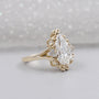 Unique pear shaped diamond engagement ring design