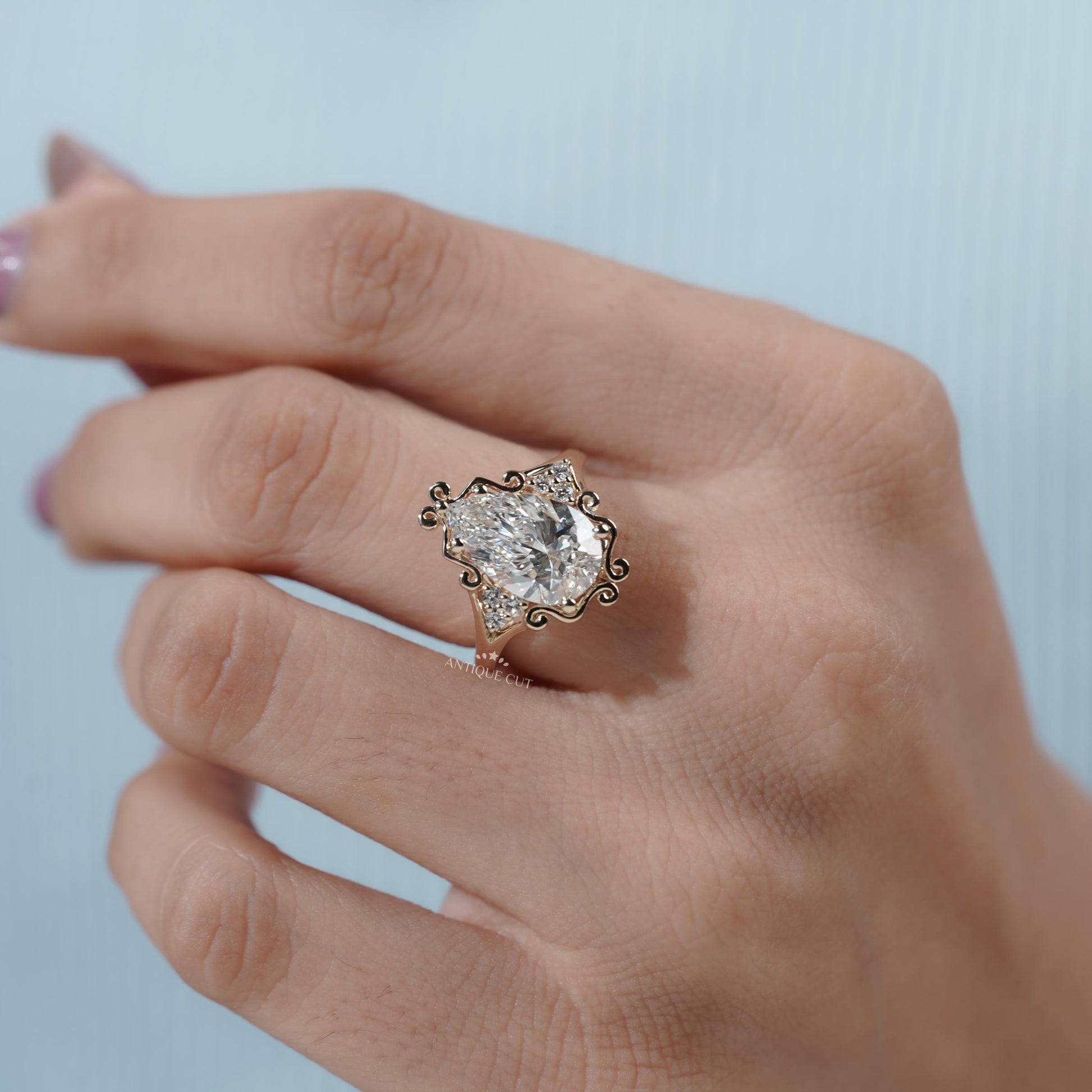 Pear shaped solitaire diamond ring with classic gold setting