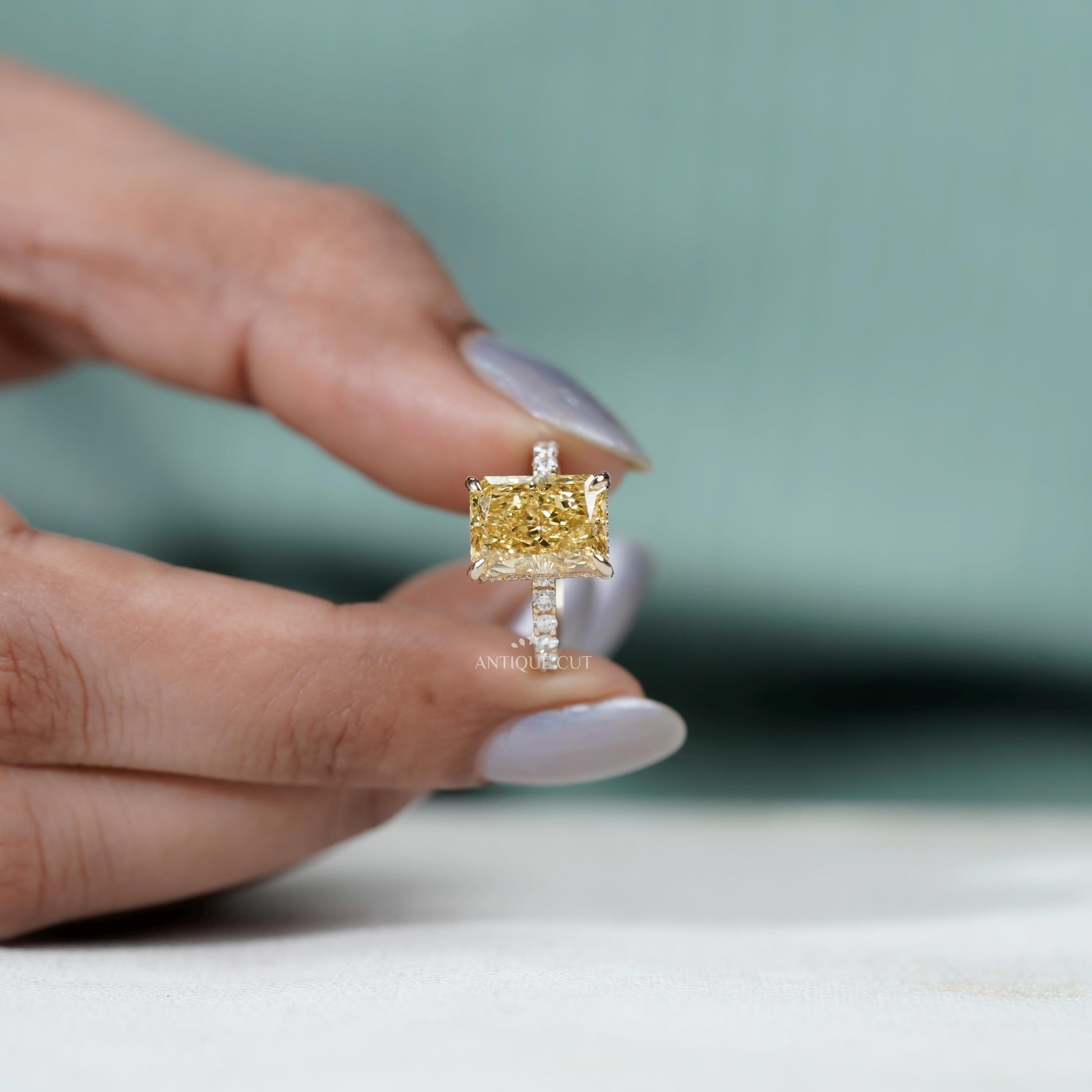 Elegant hidden halo yellow diamond ring
