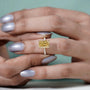 Antiquecut radiant fancy yellow diamond ring
