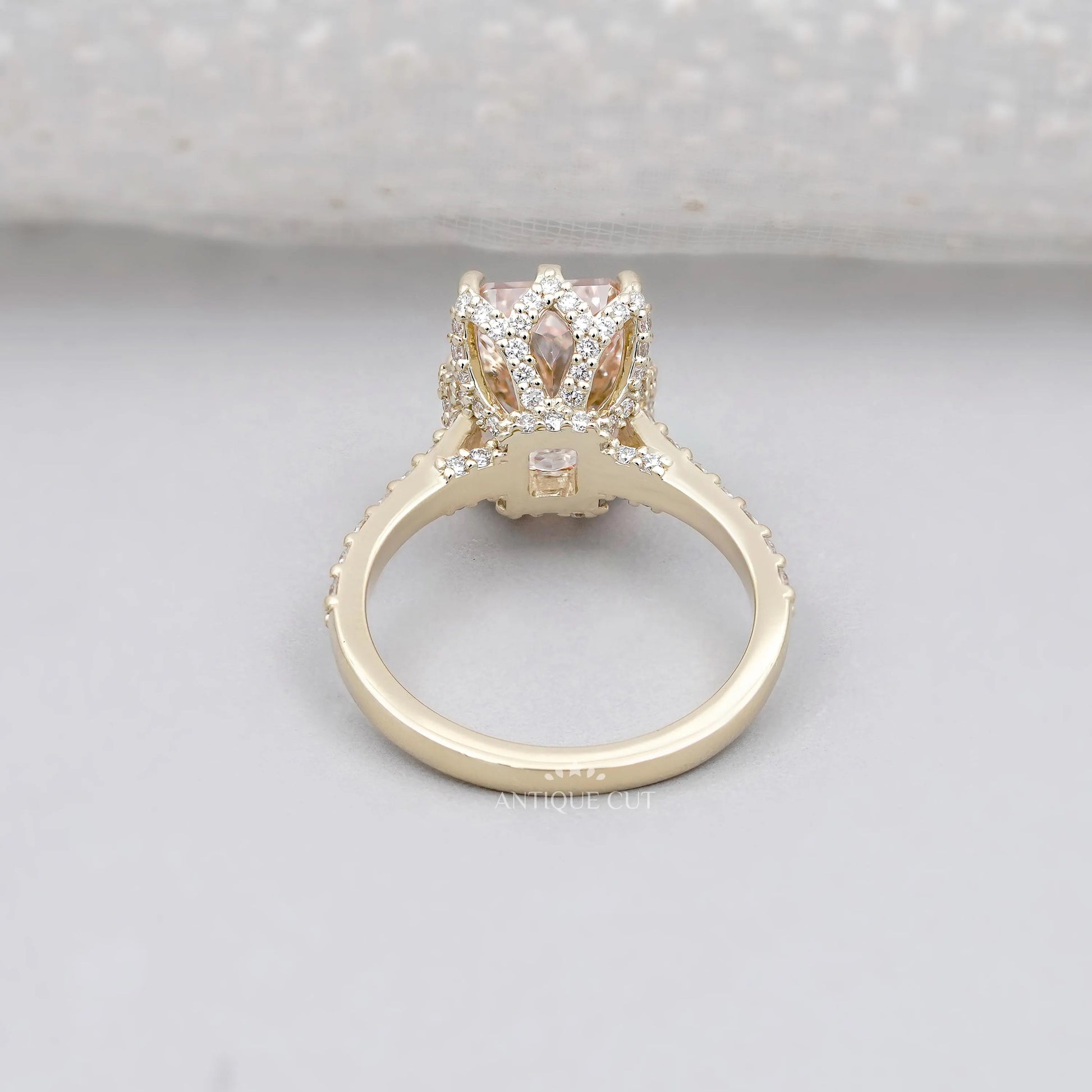 Antiquecut radiant pink diamond hidden halo engagement ring