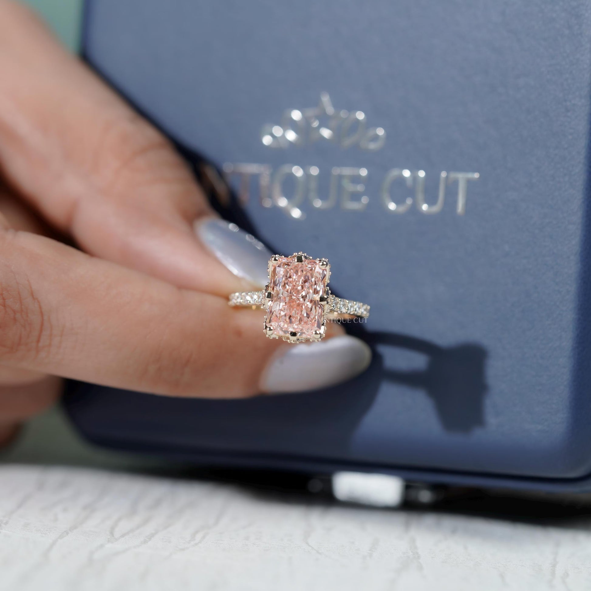 Romantic radiant pink diamond ring with pave band