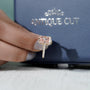 Minimalist radiant pink diamond hidden halo engagement ring